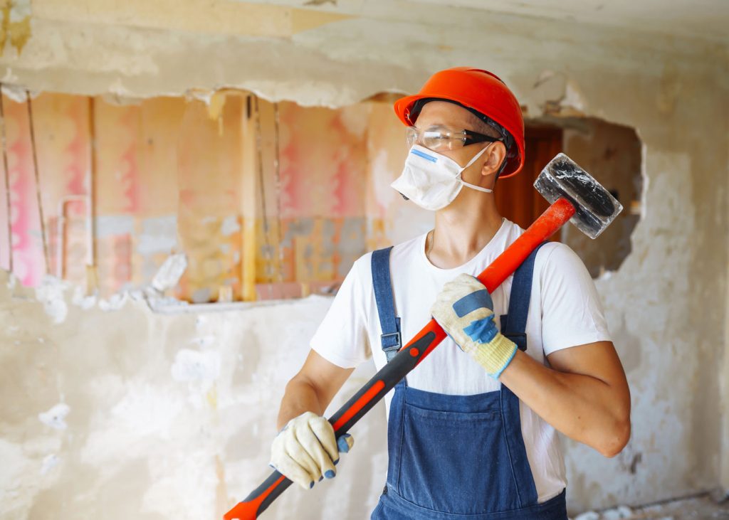 A worker preparing for demolition